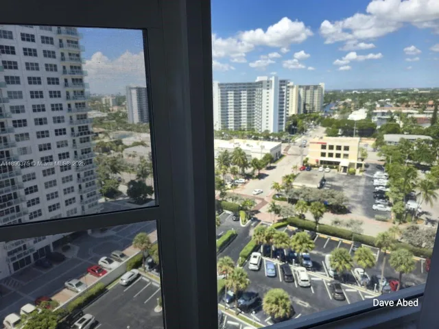 a view of a city from a dining room