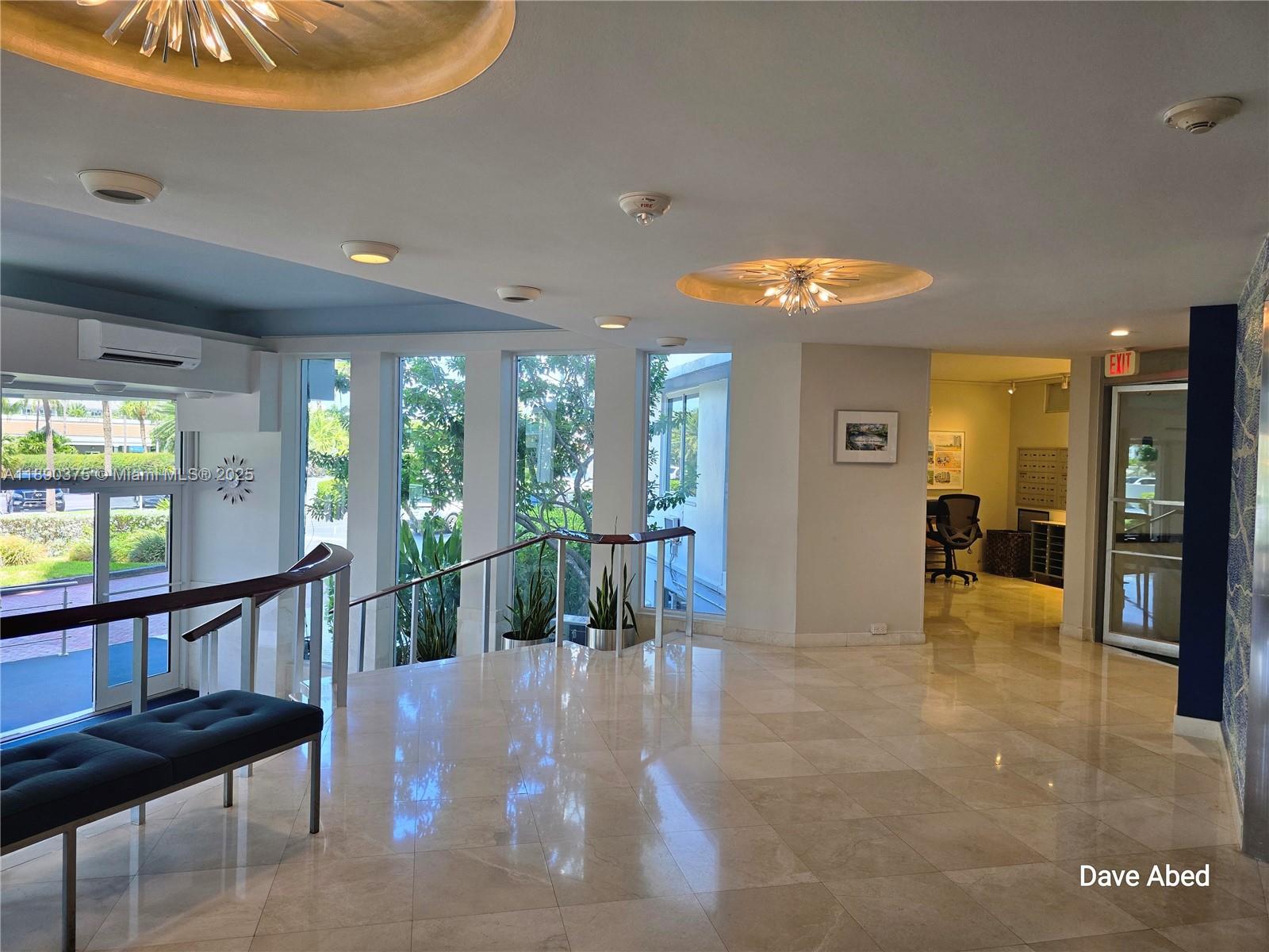 3600 Galt Ocean Drive, Unit 14C Fort Lauderdale, FL 33308 - Photo 19 of 22 a view of a livingroom with furniture and garden