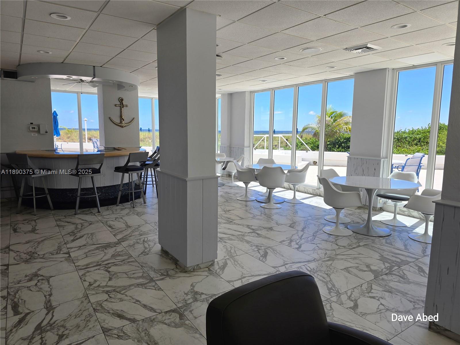 3600 Galt Ocean Drive, Unit 14C Fort Lauderdale, FL 33308 - Photo 22 of 22 a lobby with furniture and a potted plant