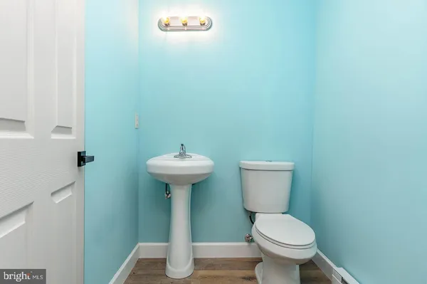 a bathroom with a sink and a toilet