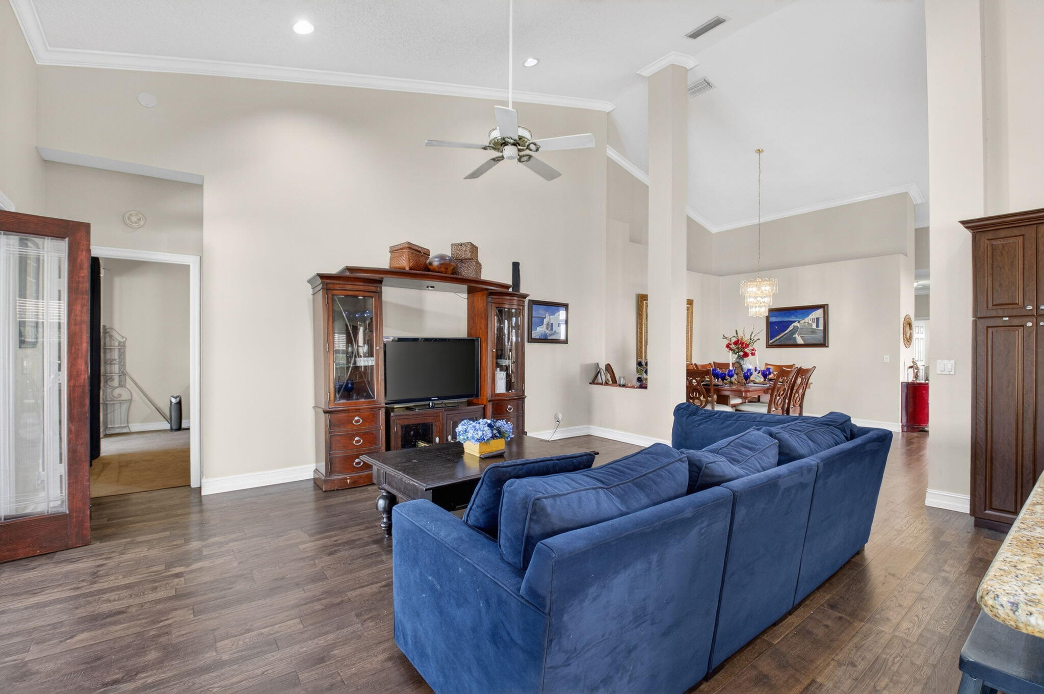 8361 Horseshoe Bay Road Boynton Beach, FL 33472 - Photo 20 of 73 a living room with furniture and a flat screen tv