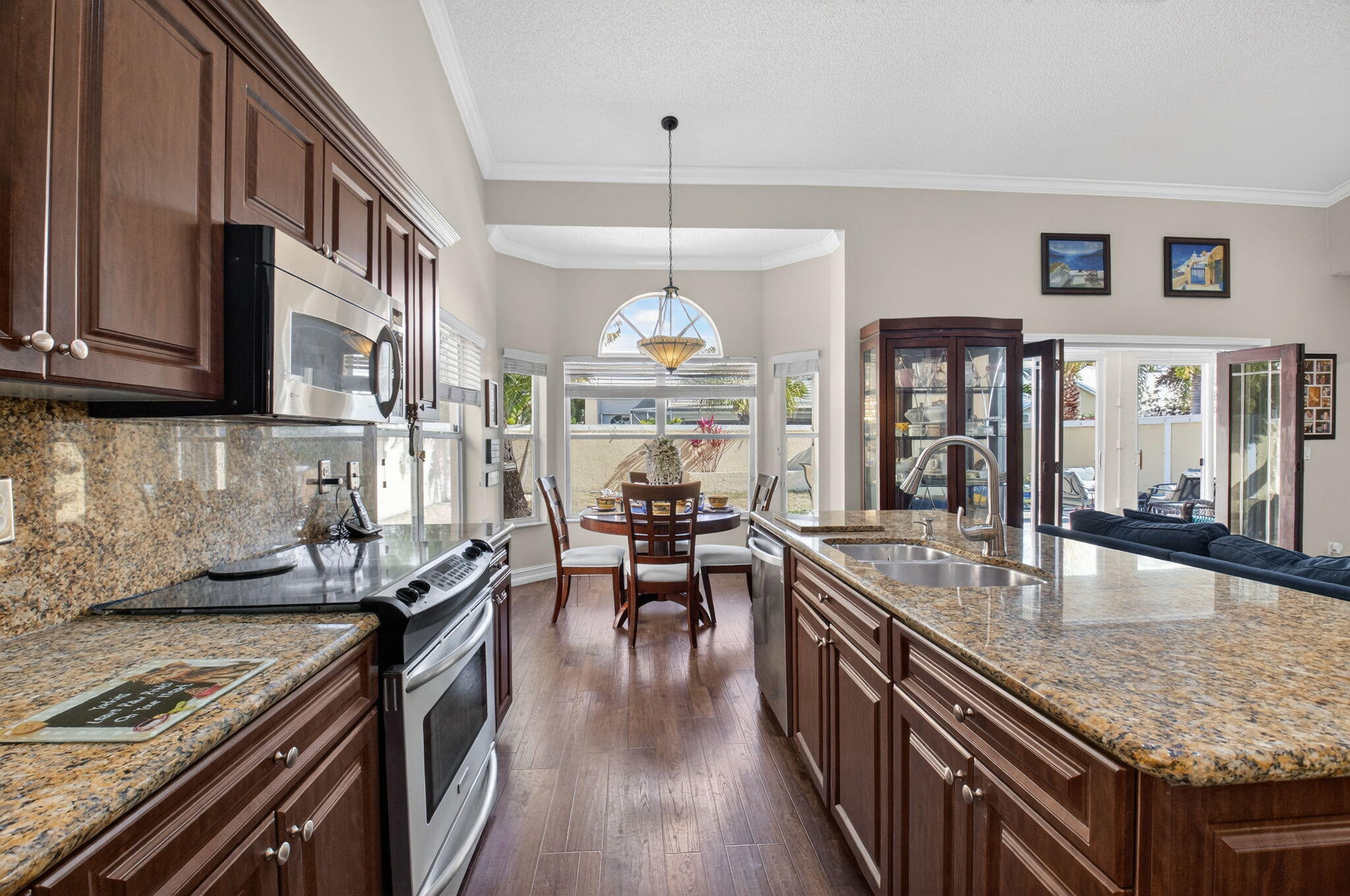 8361 Horseshoe Bay Road Boynton Beach, FL 33472 - Photo 22 of 73 a kitchen with granite countertop lots of counter top space