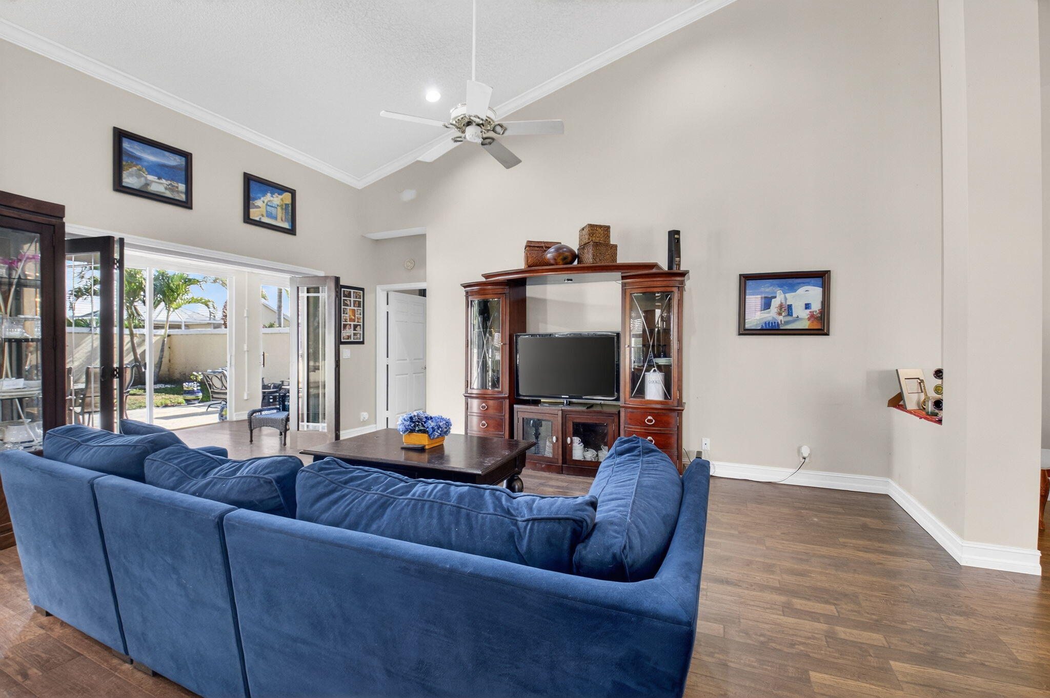 8361 Horseshoe Bay Road Boynton Beach, FL 33472 - Photo 24 of 73 a living room with furniture and a flat screen tv