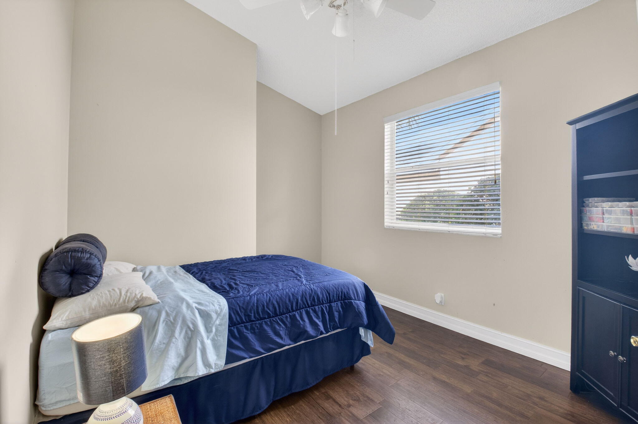 8361 Horseshoe Bay Road Boynton Beach, FL 33472 - Photo 34 of 73 a bedroom with a bed and a window