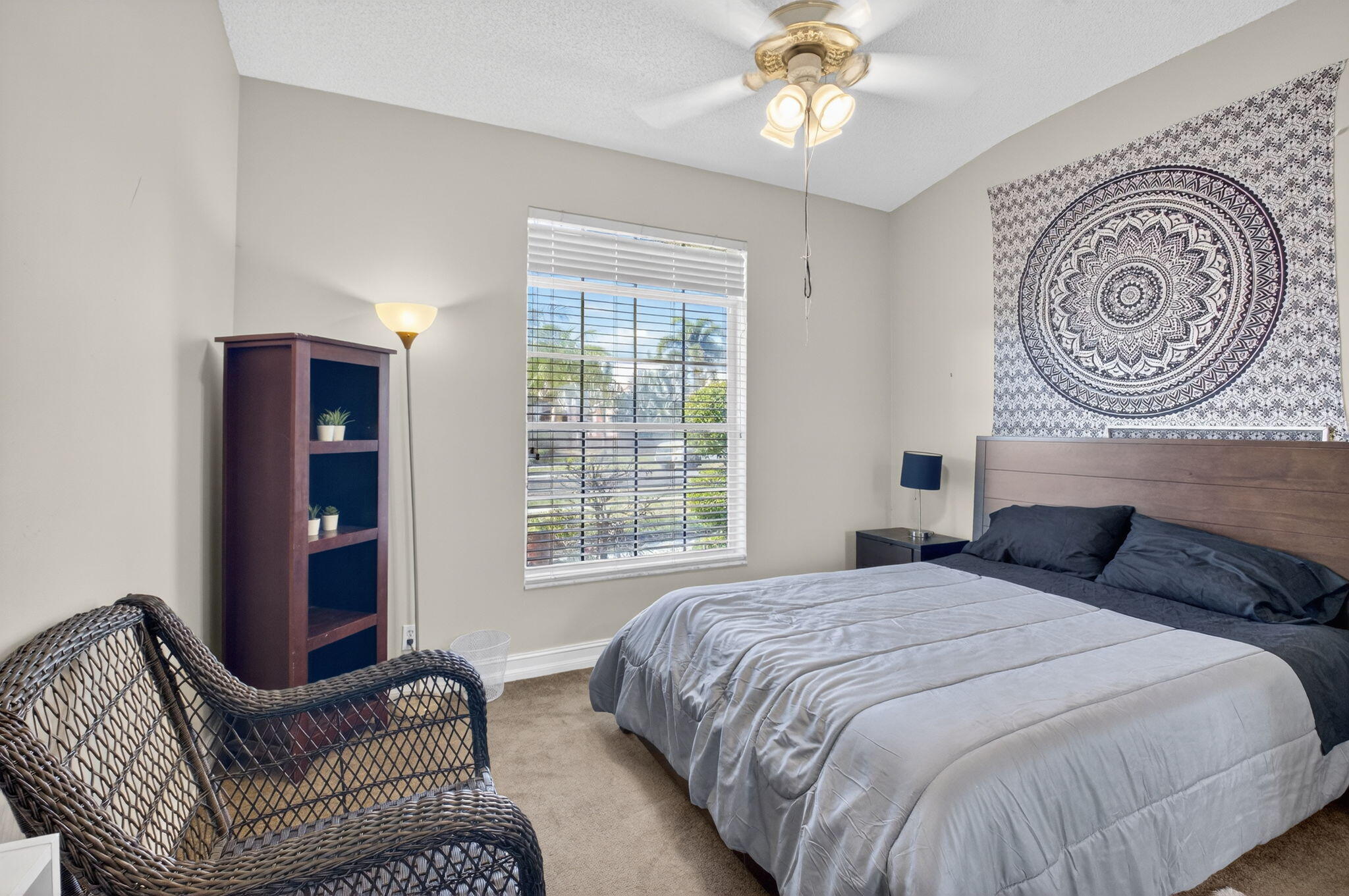8361 Horseshoe Bay Road Boynton Beach, FL 33472 - Photo 36 of 73 a bedroom with a bed and a chair