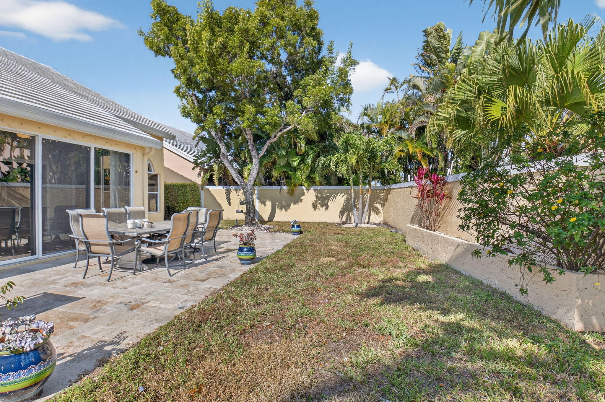 8361 Horseshoe Bay Road Boynton Beach, FL 33472 - Photo 44 of 73 a view of a outdoor space with a patio and sitting area