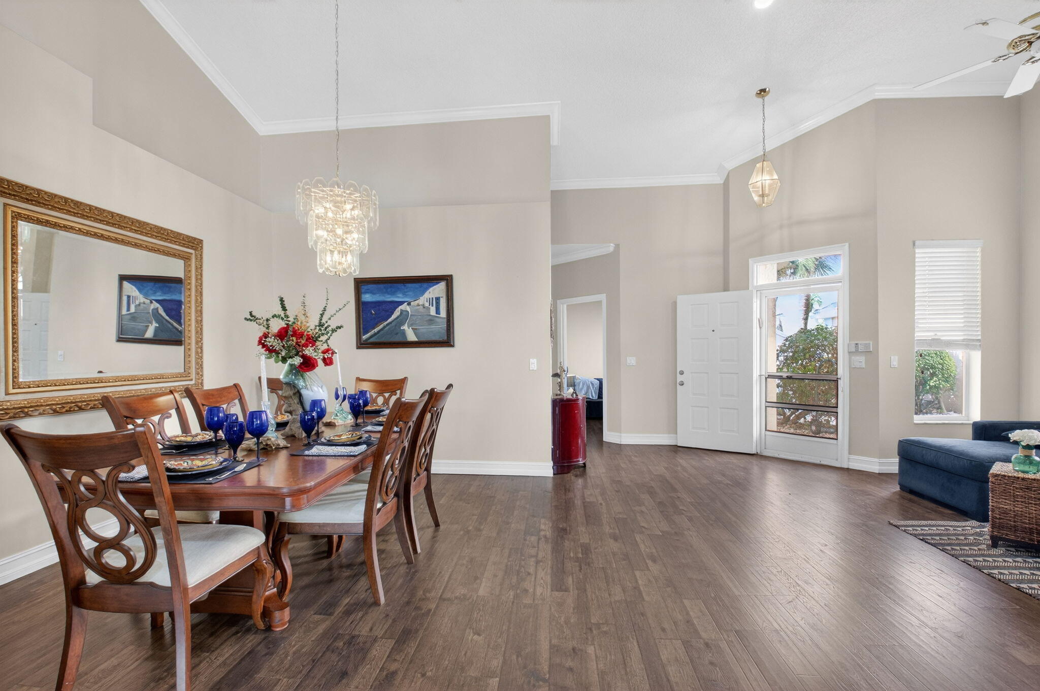 8361 Horseshoe Bay Road Boynton Beach, FL 33472 - Photo 9 of 73 a view of a dining room with furniture and wooden floor