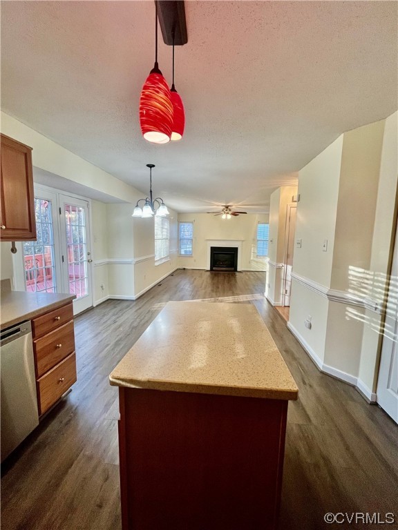 1023 Bogart Road Richmond, VA 23223 - Photo 13 of 40 a kitchen with kitchen island a counter space a sink appliances and cabinets