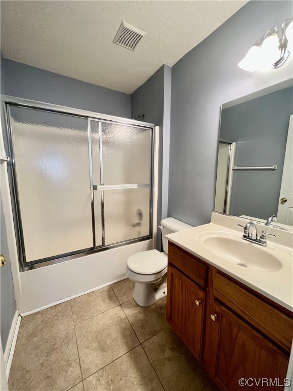 1023 Bogart Road Richmond, VA 23223 - Photo 18 of 40 a spacious bathroom with a granite countertop sink toilet and a mirror
