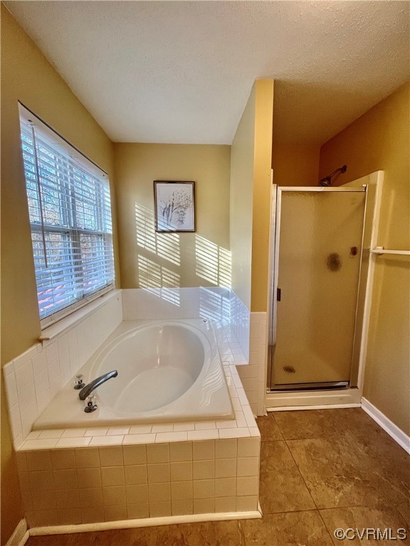 1023 Bogart Road Richmond, VA 23223 - Photo 25 of 40 a bathroom with a tub sink and shower