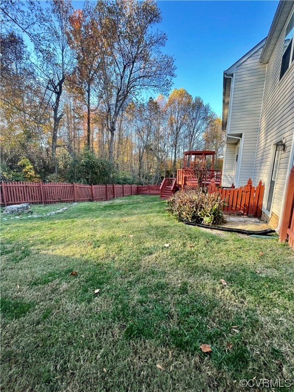 1023 Bogart Road Richmond, VA 23223 - Photo 31 of 40 a view of a backyard with a trampoline