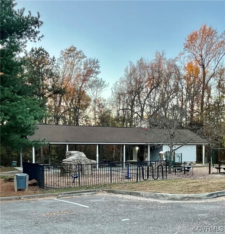 1023 Bogart Road Richmond, VA 23223 - Photo 40 of 40 a front view of a house with a garden and tree