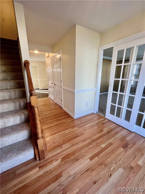 1023 Bogart Road Richmond, VA 23223 - Photo 4 of 40 a view of front door with wooden floor and stairs