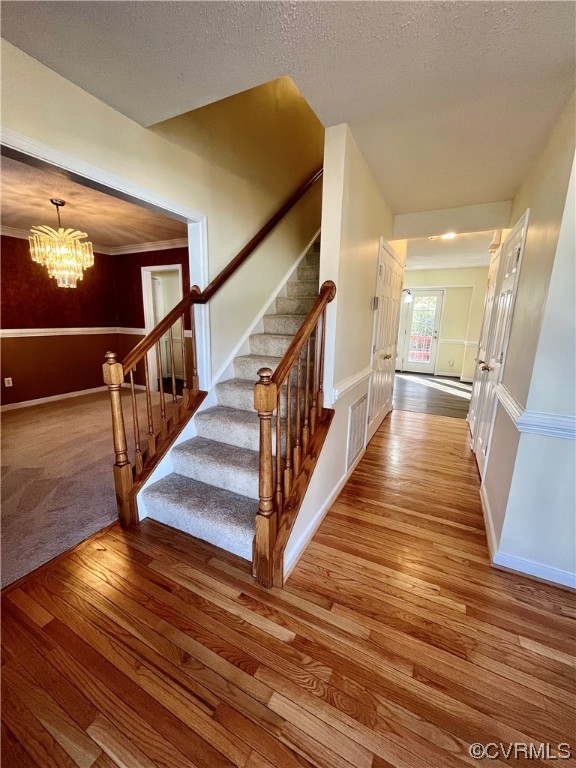 1023 Bogart Road Richmond, VA 23223 - Photo 7 of 40 a view of entryway and hall with wooden floor