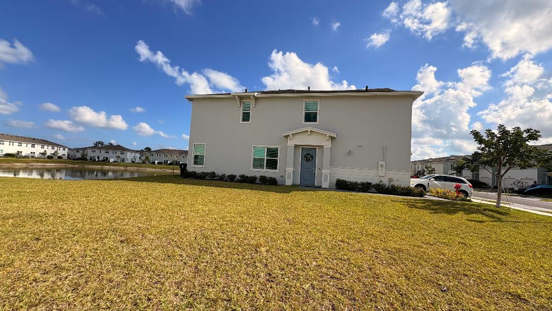 683 Southeast Lake Falls St Port Port St. Lucie, FL 34984 - Photo 1 of 1 a view of a house with swimming pool and sitting area