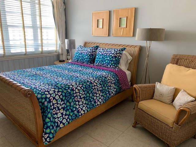 100 Lincoln Road, Unit 1434 Miami Beach, FL 33139 - Photo 5 of 30 a bedroom with a bed and window
