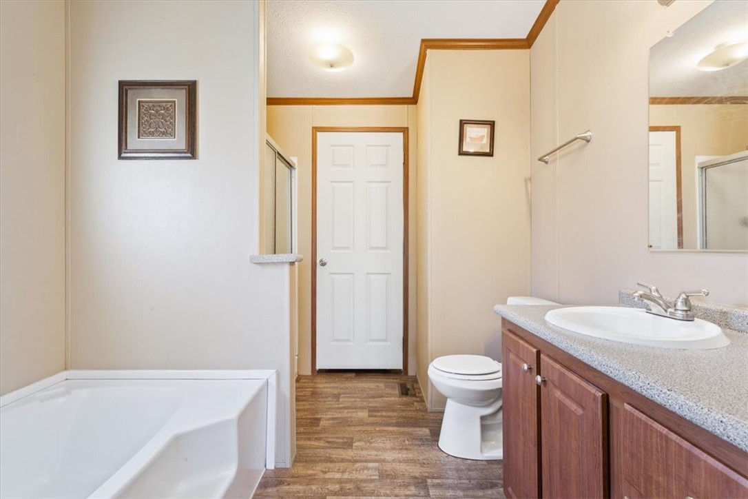 4517 Rocking K Drive Waco, TX 76705 - Photo 14 of 25 a bathroom with a sink a toilet and shower