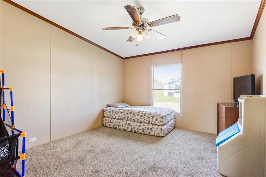 4517 Rocking K Drive Waco, TX 76705 - Photo 18 of 25 a living room with furniture and a flat screen tv