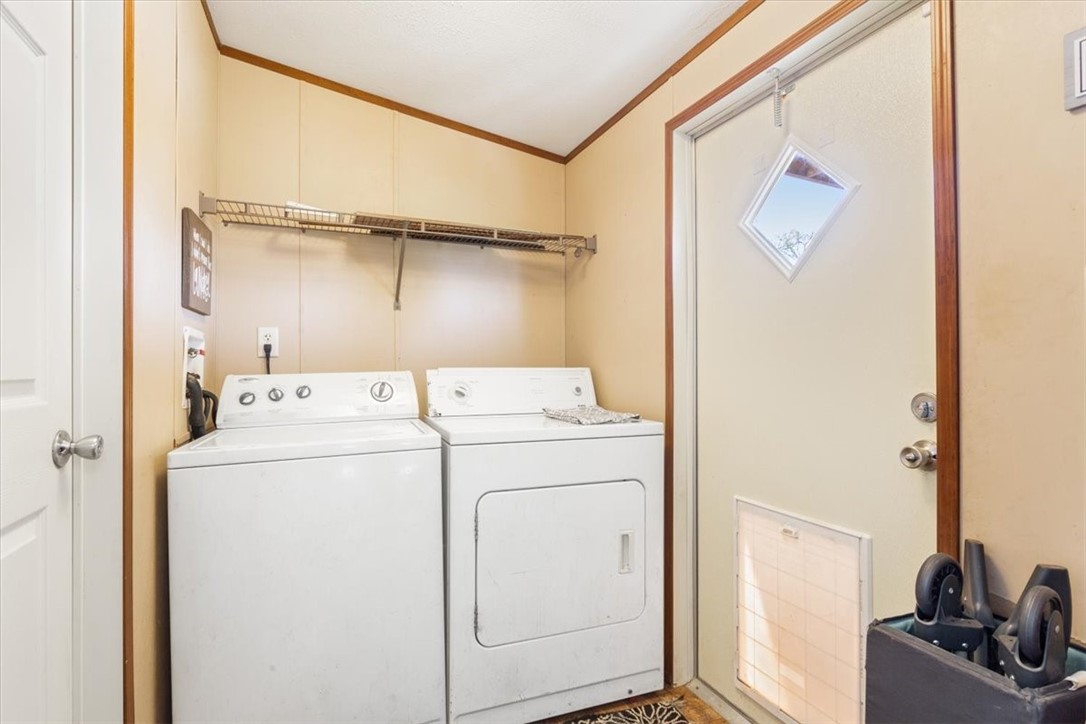 4517 Rocking K Drive Waco, TX 76705 - Photo 20 of 25 a utility room with dryer and washer