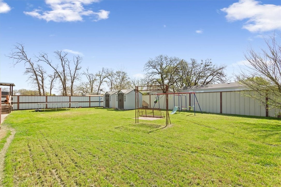 4517 Rocking K Drive Waco, TX 76705 - Photo 24 of 25 a swimming pool with outdoor seating and yard