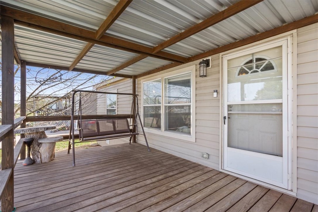 4517 Rocking K Drive Waco, TX 76705 - Photo 3 of 25 a view of a porch with wooden floor