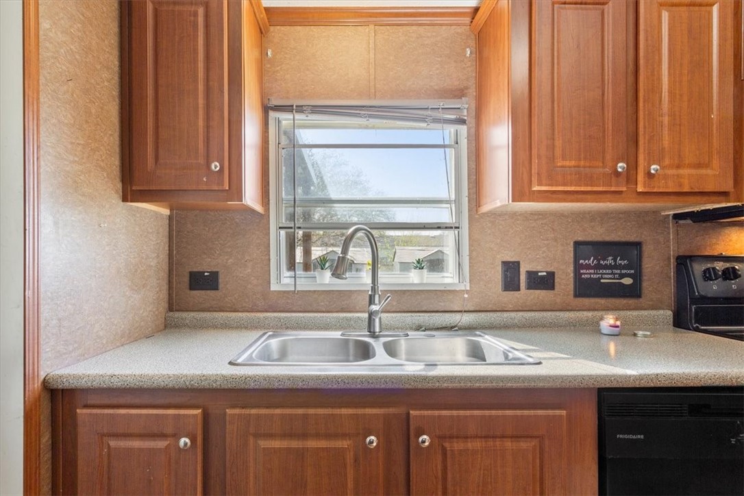 4517 Rocking K Drive Waco, TX 76705 - Photo 9 of 25 a kitchen with a sink and cabinets