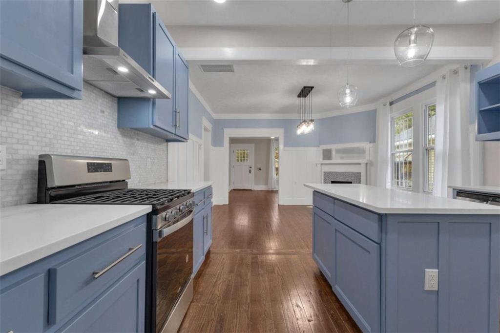 1286 Allene Avenue Southwest Atlanta, GA 30310 - Photo 17 of 49 a kitchen with stainless steel appliances granite countertop a stove and a sink