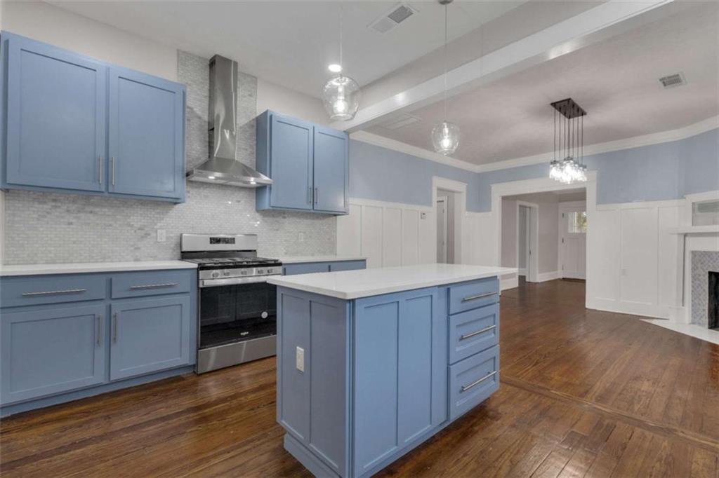 1286 Allene Avenue Southwest Atlanta, GA 30310 - Photo 18 of 49 a kitchen with wooden cabinets and a sink
