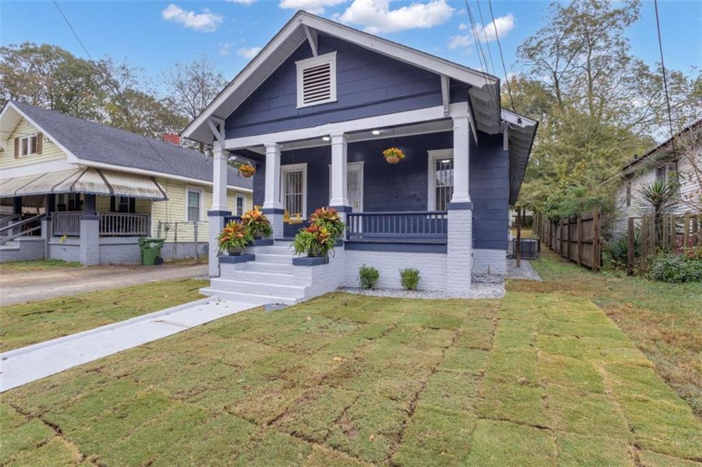 1286 Allene Avenue Southwest Atlanta, GA 30310 - Photo 2 of 49 a view of a house with table and chairs in patio