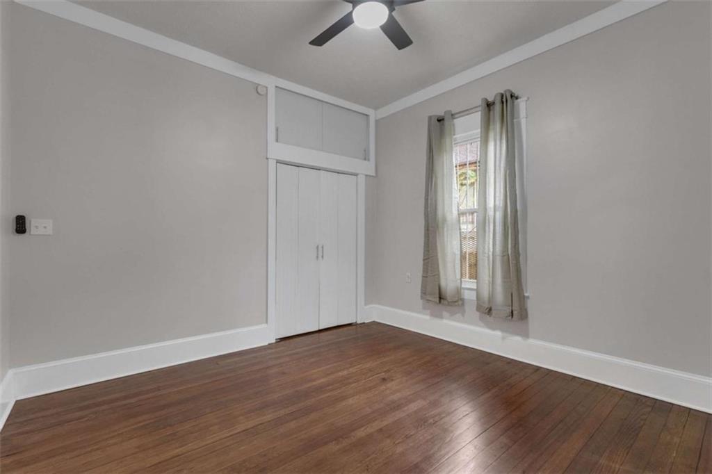 1286 Allene Avenue Southwest Atlanta, GA 30310 - Photo 21 of 49 wooden floor in an empty room