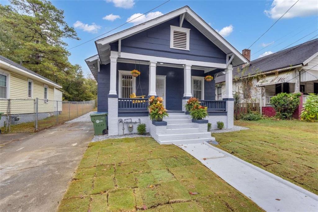 1286 Allene Avenue Southwest Atlanta, GA 30310 - Photo 3 of 49 a front view of a house with porch