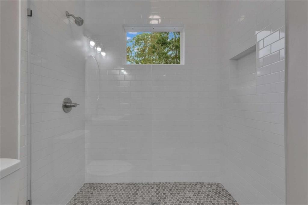 1286 Allene Avenue Southwest Atlanta, GA 30310 - Photo 35 of 49 a bathroom with a shower