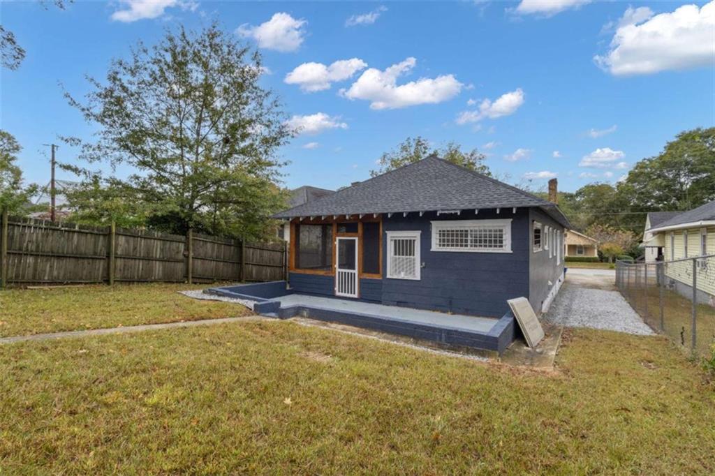 1286 Allene Avenue Southwest Atlanta, GA 30310 - Photo 47 of 49 a backyard of a house with table and chairs