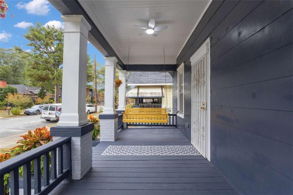 1286 Allene Avenue Southwest Atlanta, GA 30310 - Photo 5 of 49 a view of a porch with wooden floor and outdoor space