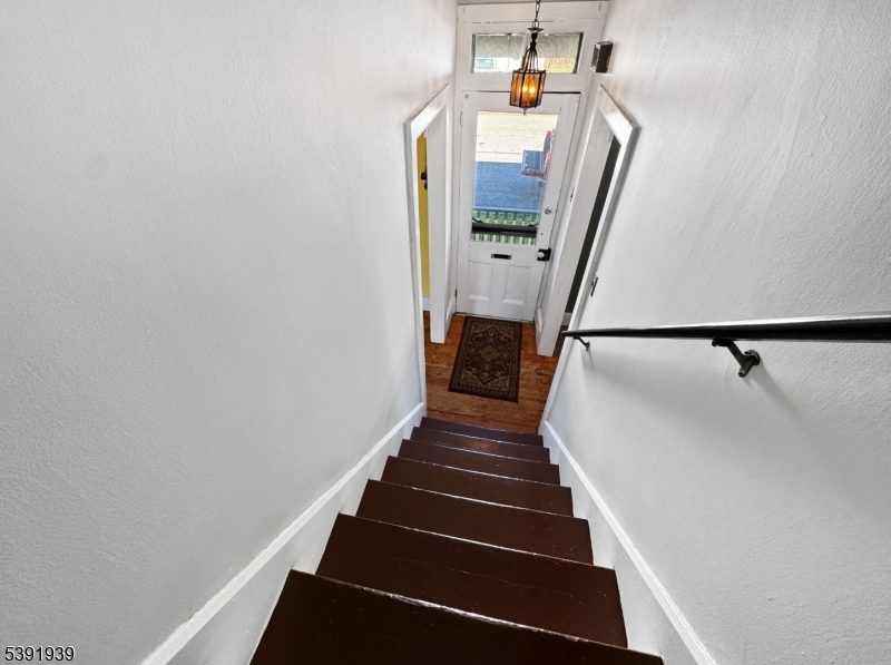 54 Front Street Belvidere, NJ 07823 - Photo 13 of 32 a view of entryway and hall with wooden floor