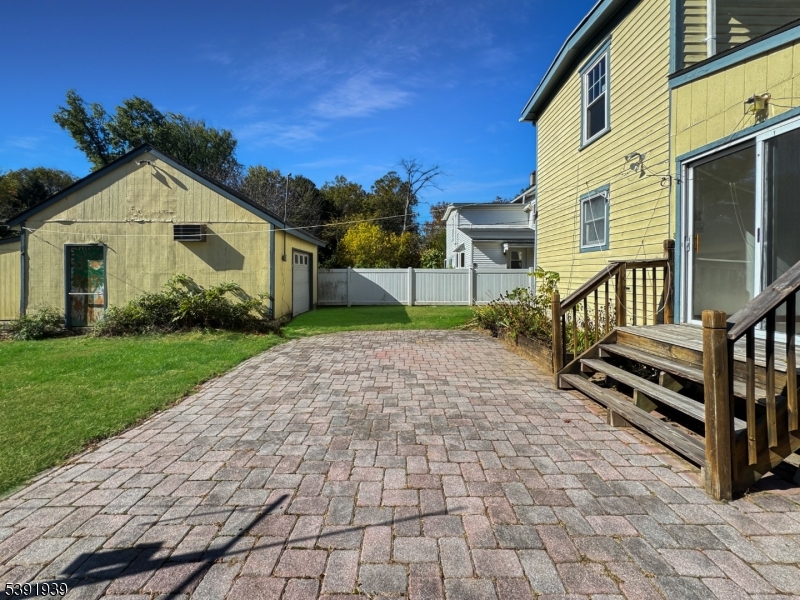 54 Front Street Belvidere, NJ 07823 - Photo 25 of 32 a view of a brick house with a yard