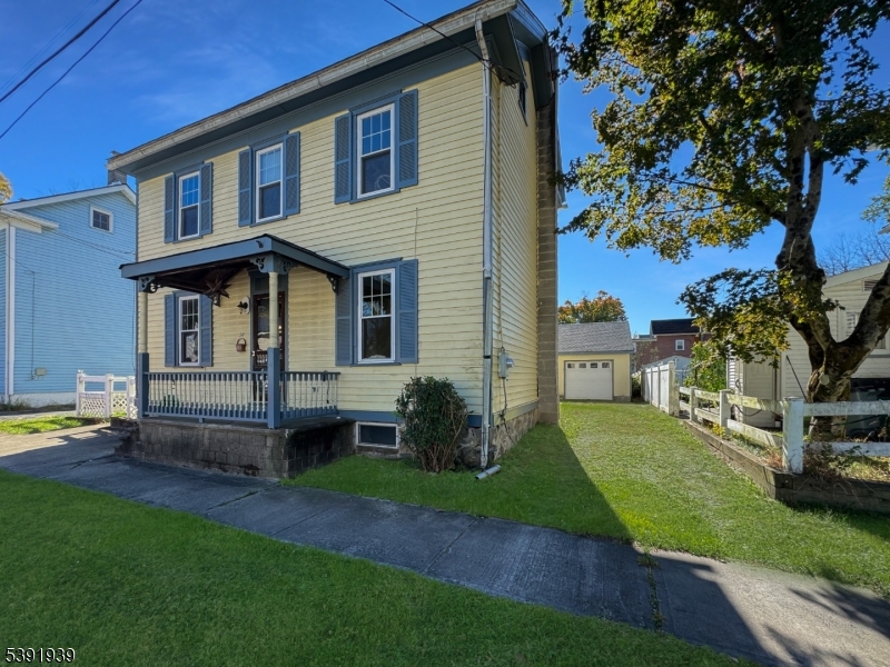 54 Front Street Belvidere, NJ 07823 - Photo 32 of 32 a front view of a house with garden