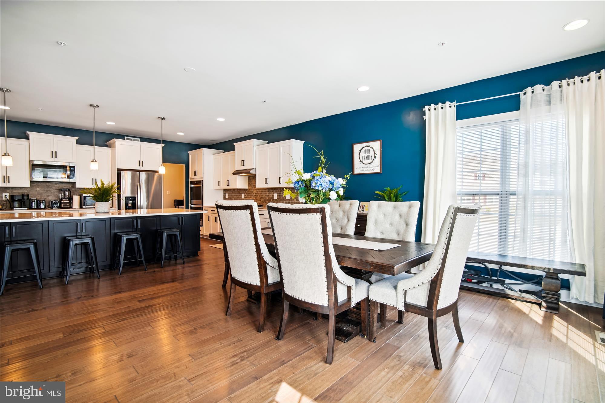 12600 Abercorn Place Brandywine, MD 20613 - Photo 11 of 43 a dining room with furniture and wooden floor