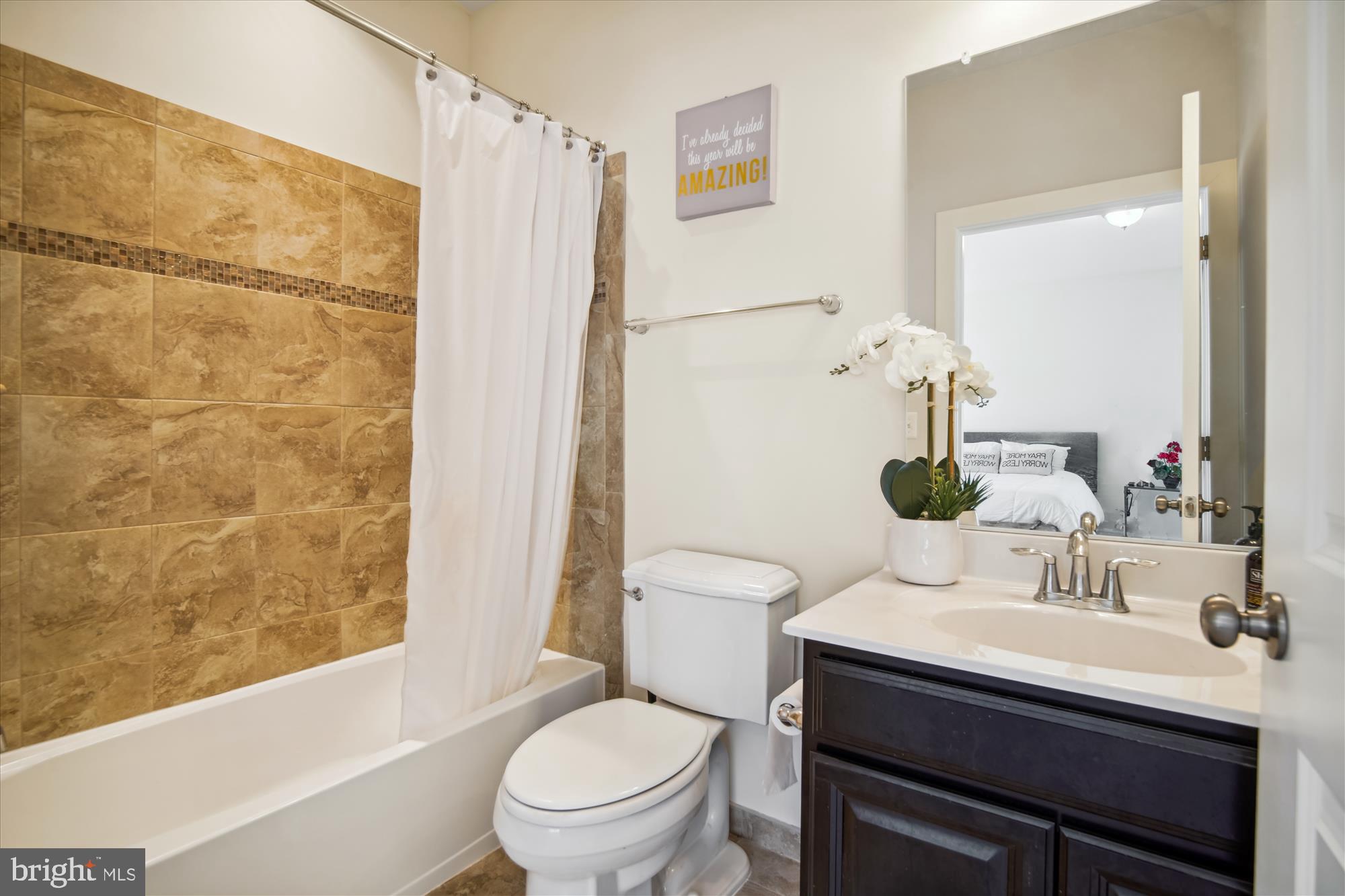 12600 Abercorn Place Brandywine, MD 20613 - Photo 19 of 43 a bathroom with a sink toilet and shower
