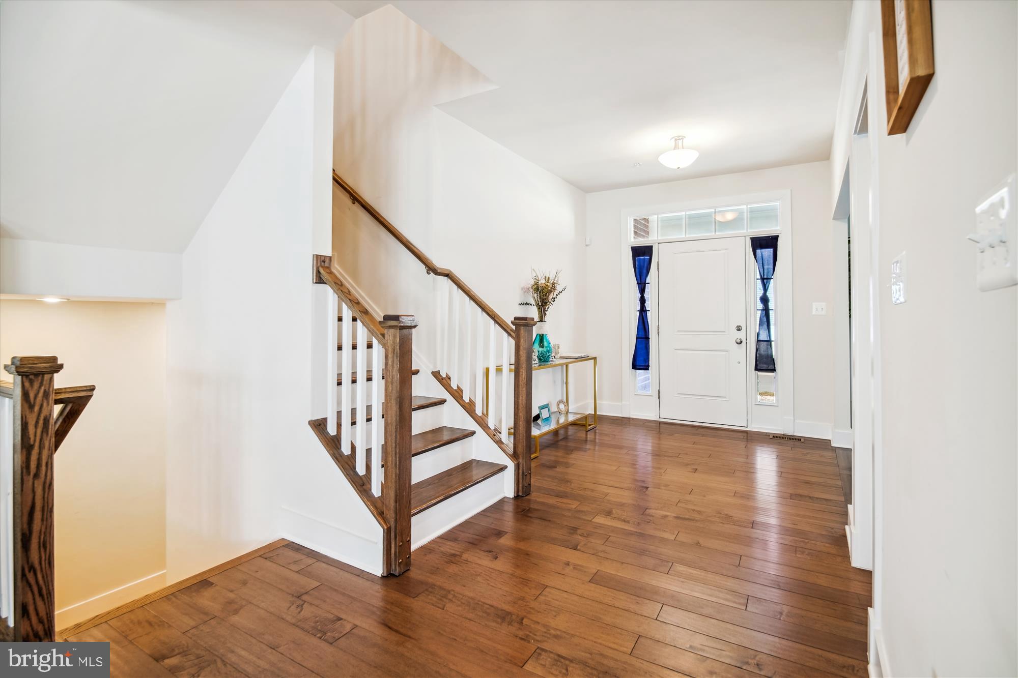 12600 Abercorn Place Brandywine, MD 20613 - Photo 20 of 43 a view of entryway and hall with wooden floor