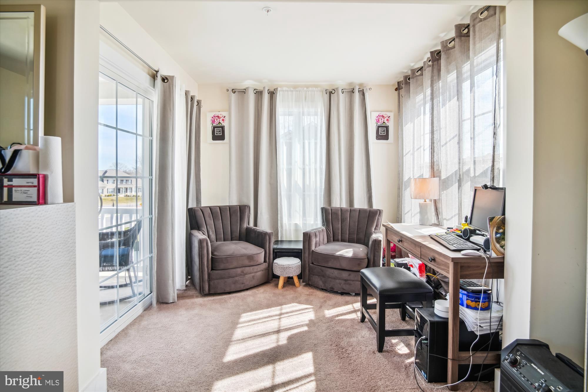 12600 Abercorn Place Brandywine, MD 20613 - Photo 23 of 43 a bedroom with furniture and a large window