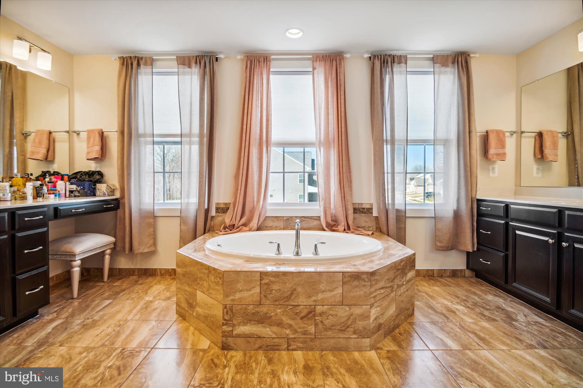 12600 Abercorn Place Brandywine, MD 20613 - Photo 26 of 43 a spacious bathroom with a tub sink and mirror