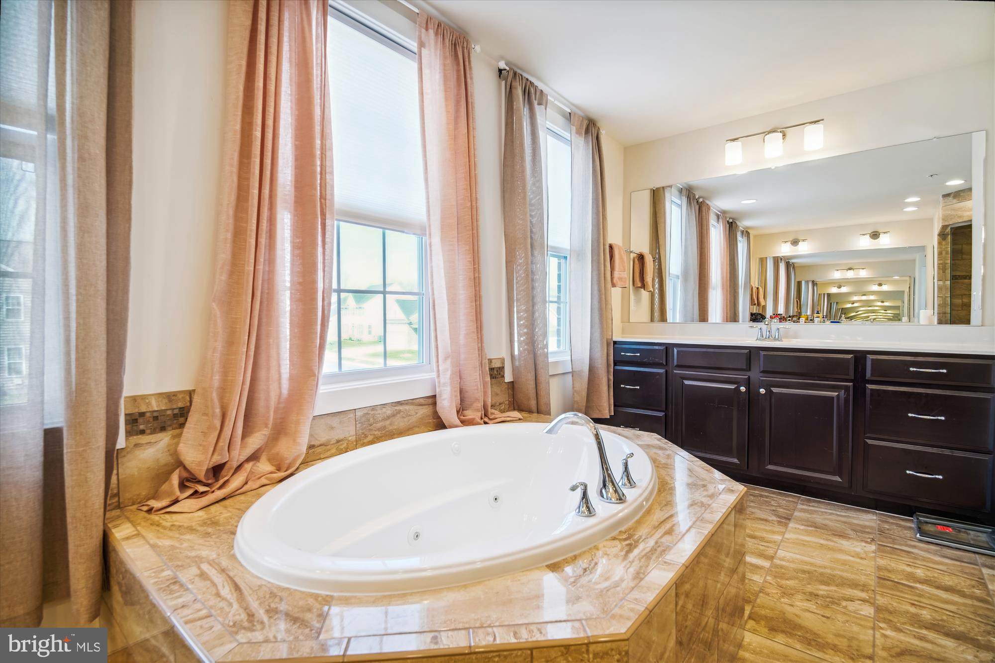 12600 Abercorn Place Brandywine, MD 20613 - Photo 27 of 43 a spacious bathroom with a tub and sink