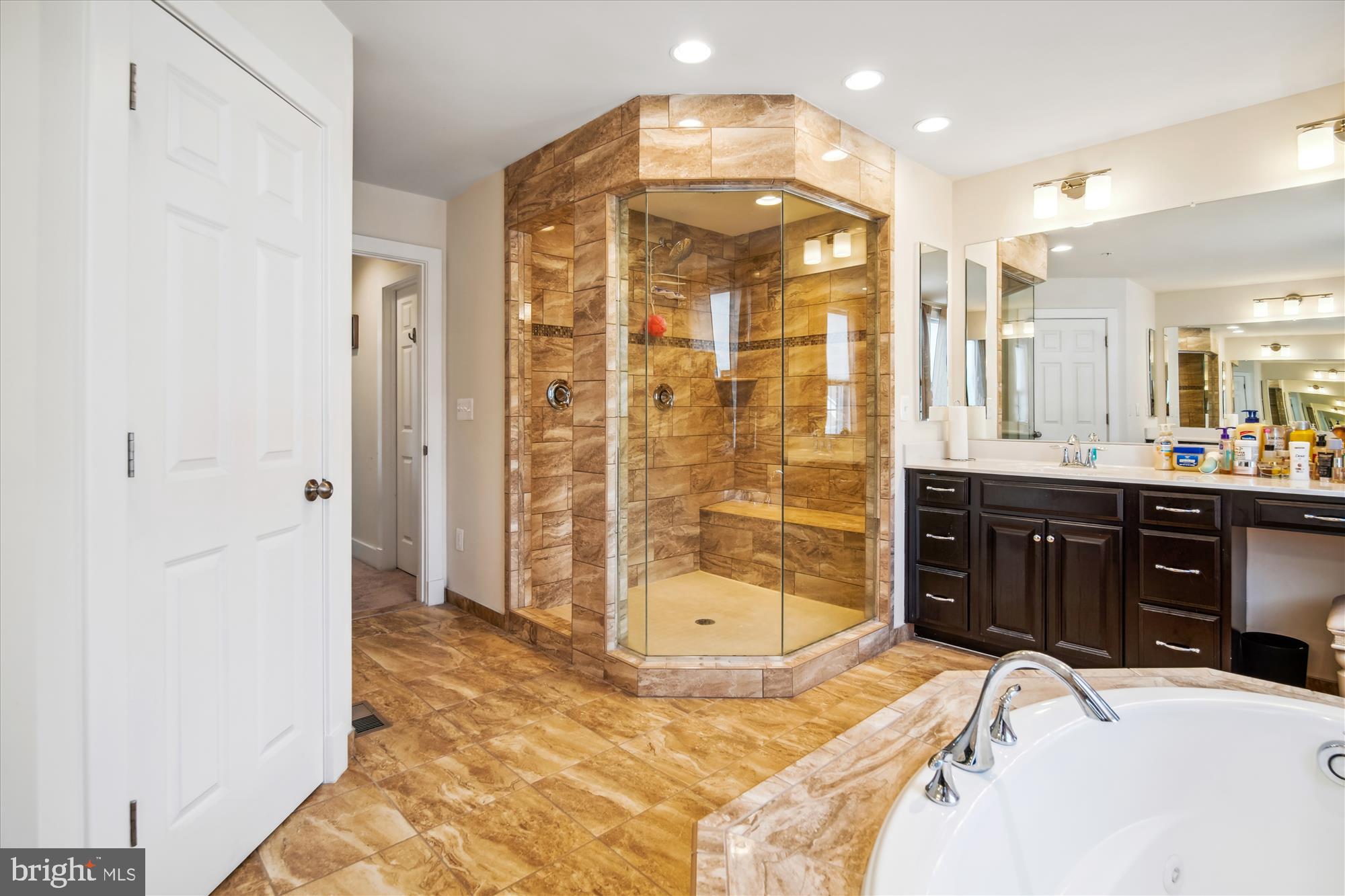 12600 Abercorn Place Brandywine, MD 20613 - Photo 28 of 43 a bathroom with a sink shower and a mirror