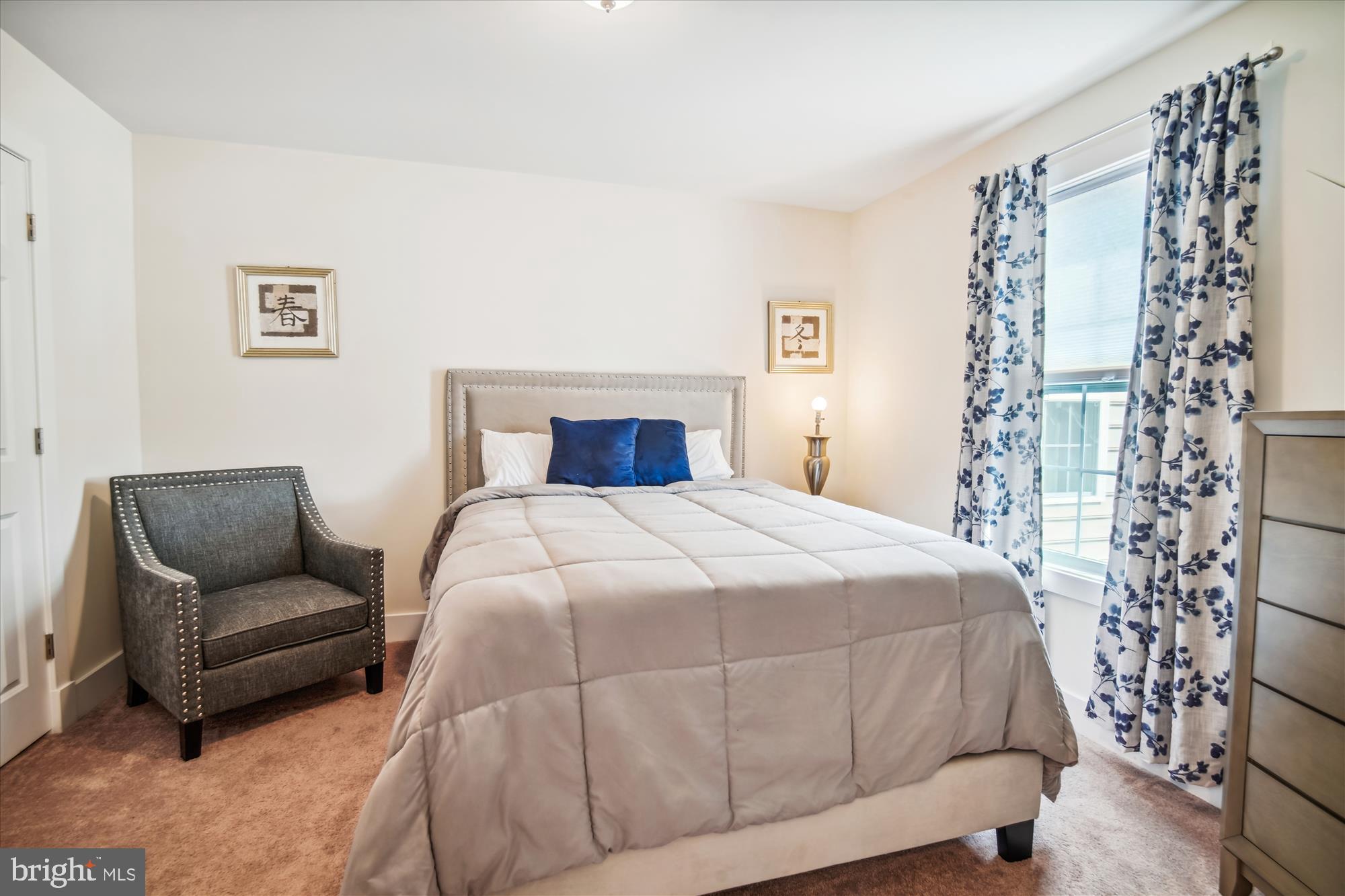 12600 Abercorn Place Brandywine, MD 20613 - Photo 31 of 43 a bedroom with a bed and a couch