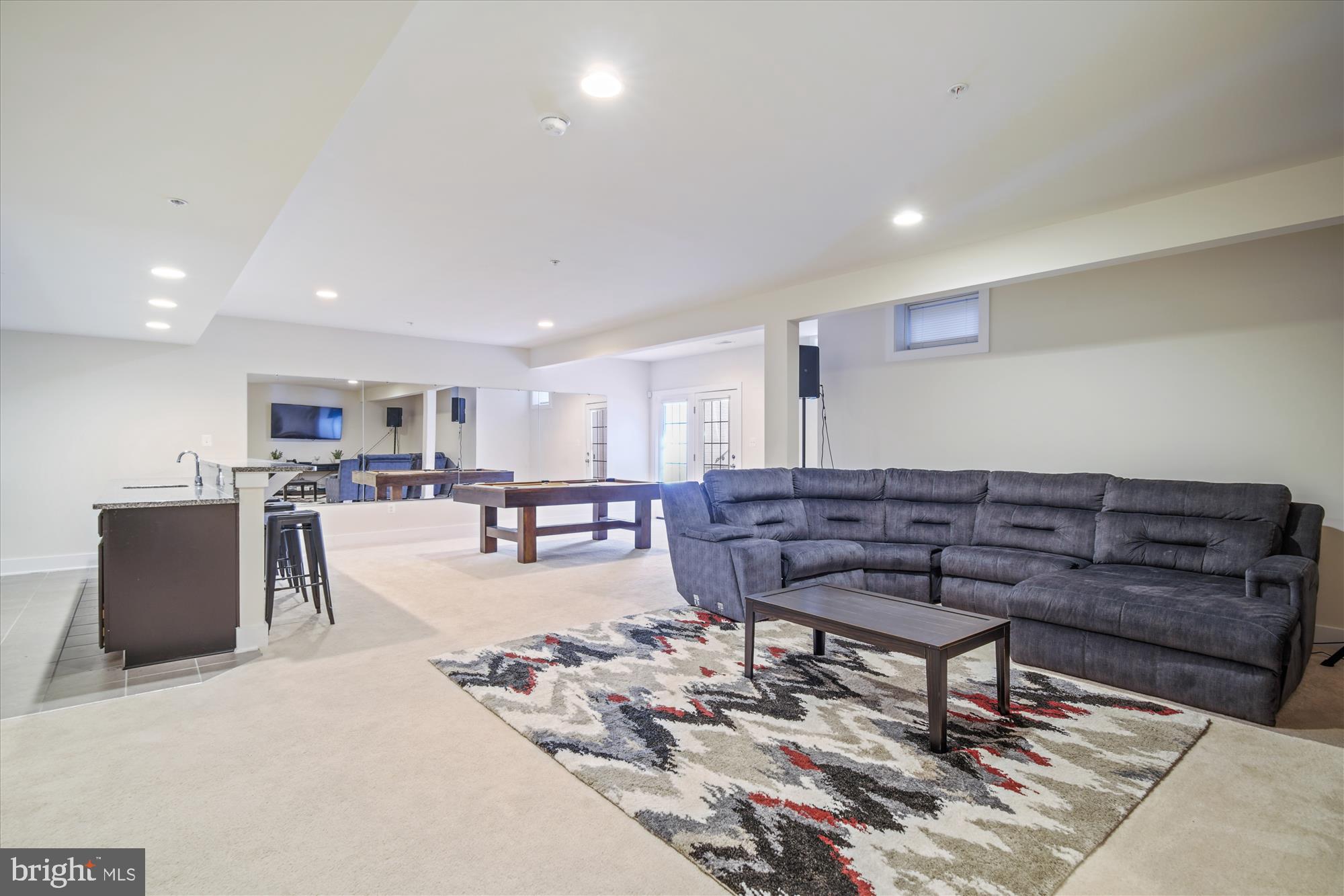 12600 Abercorn Place Brandywine, MD 20613 - Photo 35 of 43 a living room with furniture and a table
