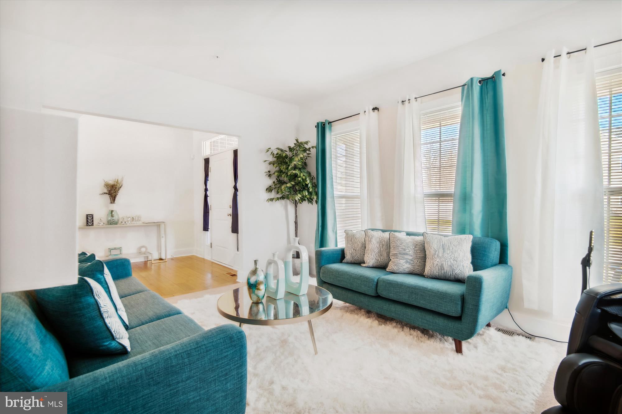 12600 Abercorn Place Brandywine, MD 20613 - Photo 4 of 43 a living room with furniture and a large window