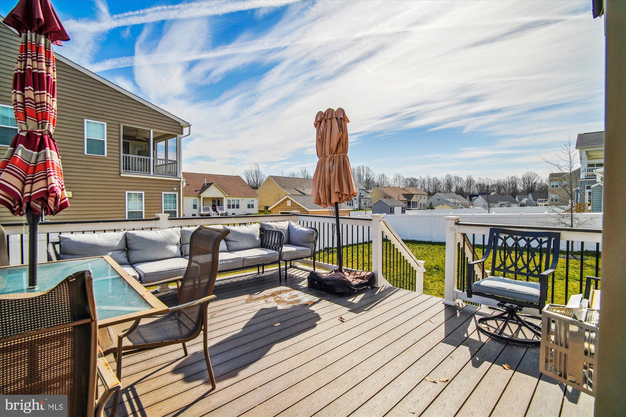 12600 Abercorn Place Brandywine, MD 20613 - Photo 41 of 43 a view of a balcony with chairs and wooden floor