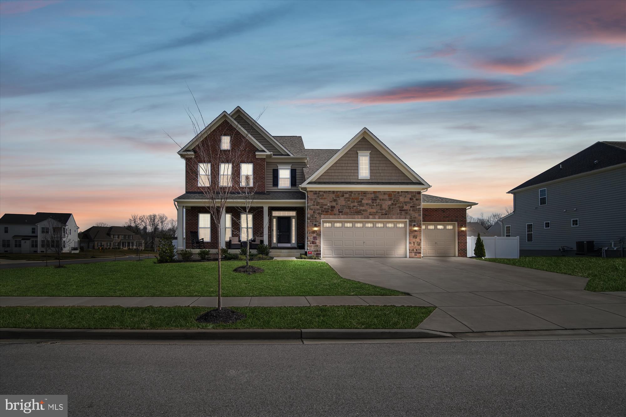 12600 Abercorn Place Brandywine, MD 20613 - Photo 43 of 43 a front view of a house with a yard