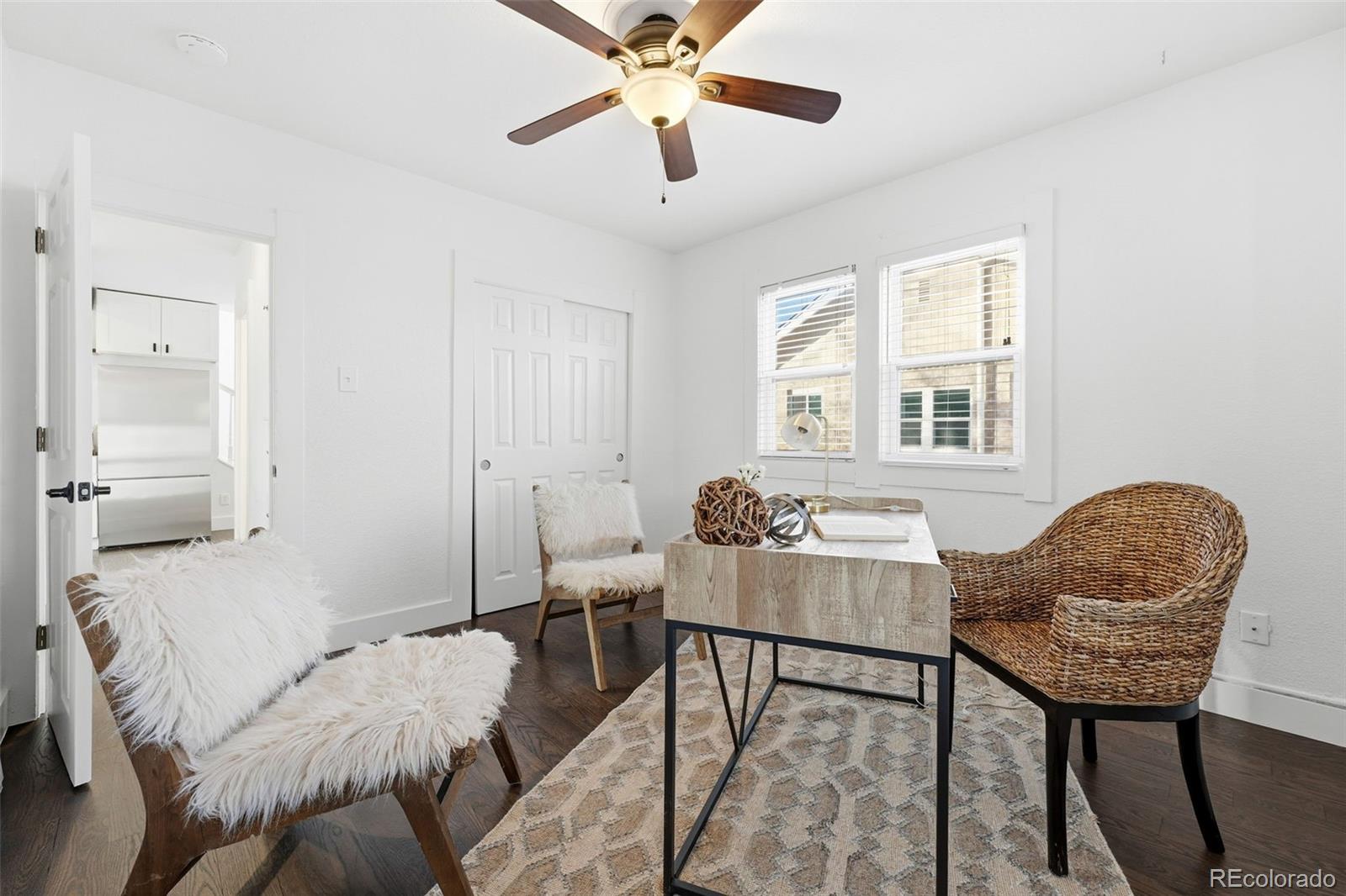 1661 Trenton Street Denver, CO 80220 - Photo 20 of 50 a living room with furniture and a window